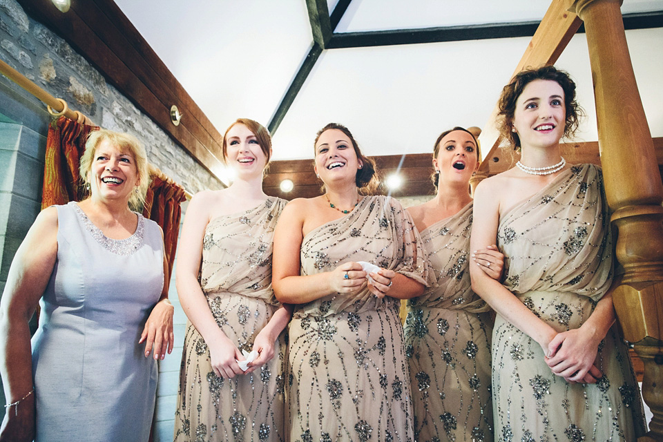 A bride wearing two dresses (including a Tadashi Shoji evening gown) for her glamorous, Gatsby inspired barn wedding. Photography by Mister Phill. mister phill photography, gastsby wedding, rustic barn wedding, tadashi shoji wedding dress