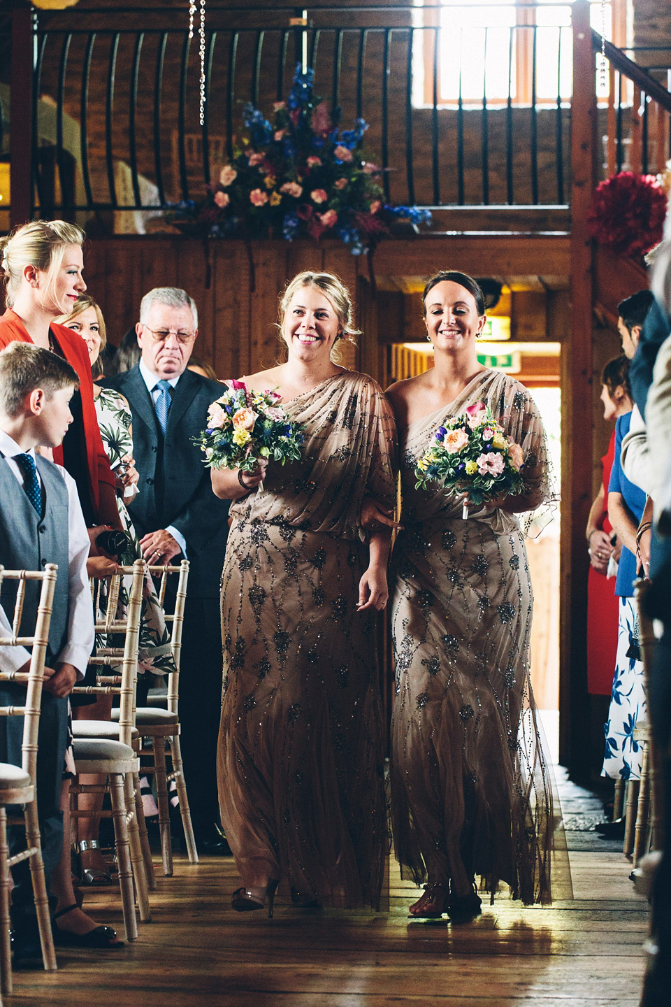 A bride wearing two dresses (including a Tadashi Shoji evening gown) for her glamorous, Gatsby inspired barn wedding. Photography by Mister Phill. mister phill photography, gastsby wedding, rustic barn wedding, tadashi shoji wedding dress