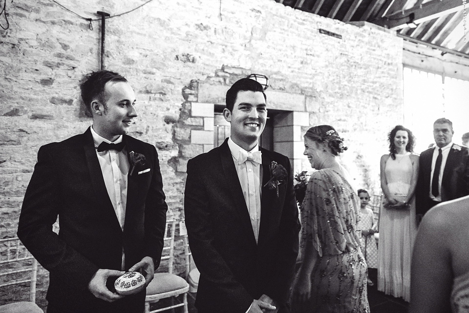 A bride wearing two dresses (including a Tadashi Shoji evening gown) for her glamorous, Gatsby inspired barn wedding. Photography by Mister Phill. mister phill photography, gastsby wedding, rustic barn wedding, tadashi shoji wedding dress