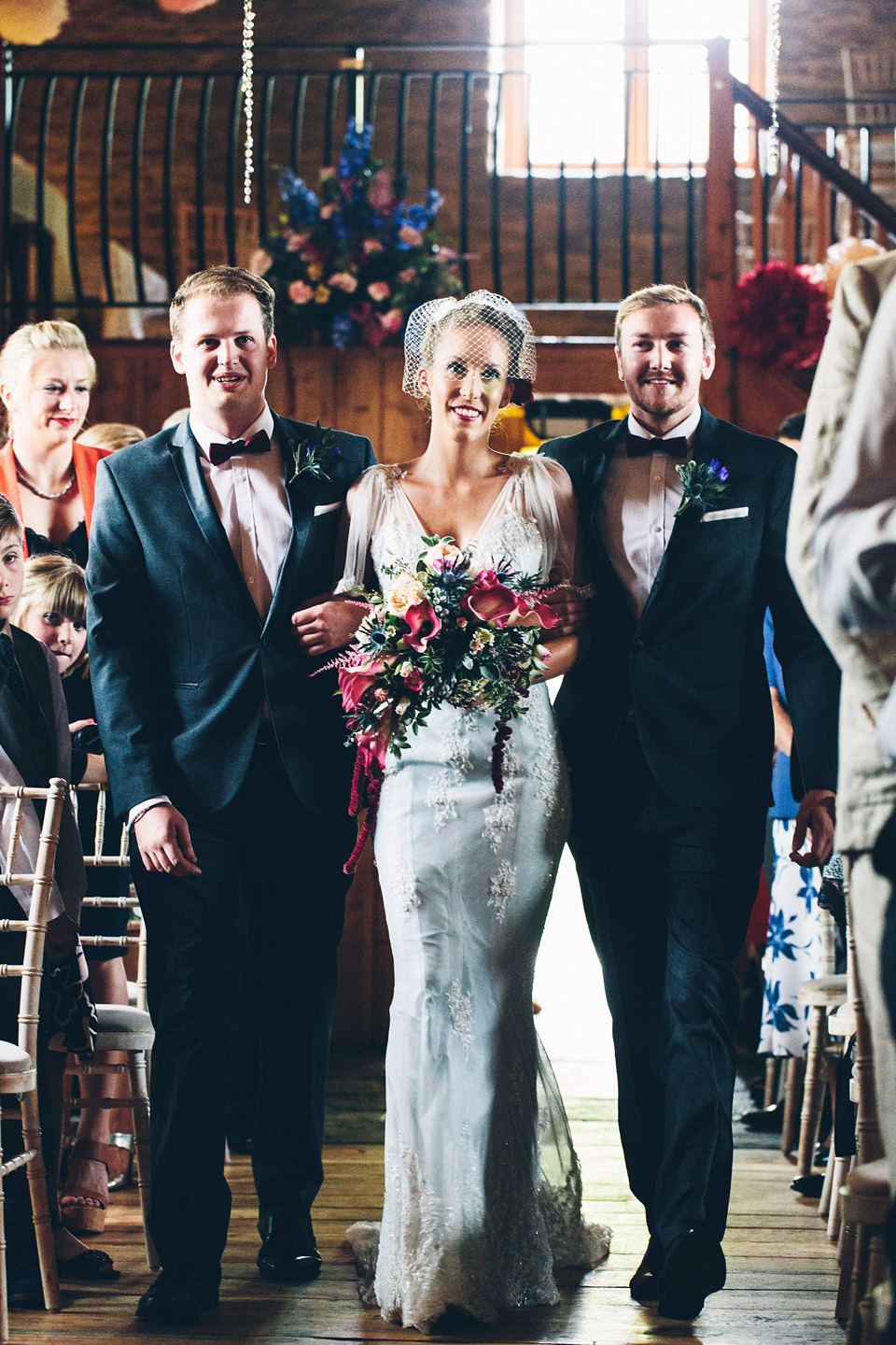 A bride wearing two dresses (including a Tadashi Shoji evening gown) for her glamorous, Gatsby inspired barn wedding. Photography by Mister Phill. mister phill photography, gastsby wedding, rustic barn wedding, tadashi shoji wedding dress