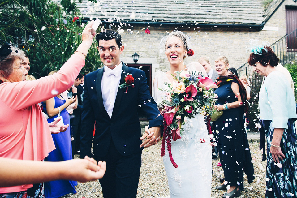 A bride wearing two dresses (including a Tadashi Shoji evening gown) for her glamorous, Gatsby inspired barn wedding. Photography by Mister Phill. mister phill photography, gastsby wedding, rustic barn wedding, tadashi shoji wedding dress