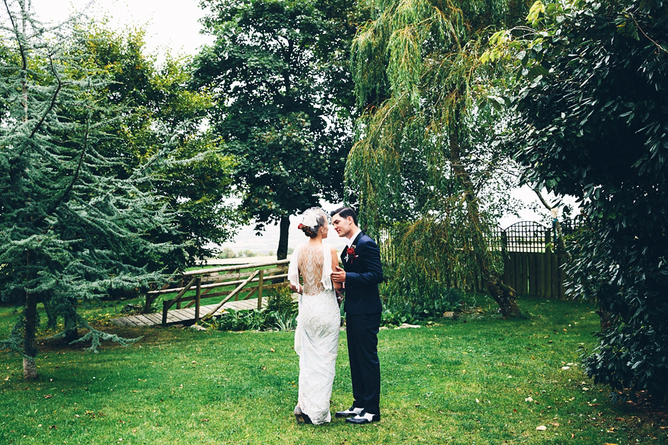 A bride wearing two dresses (including a Tadashi Shoji evening gown) for her glamorous, Gatsby inspired barn wedding. Photography by Mister Phill. mister phill photography, gastsby wedding, rustic barn wedding, tadashi shoji wedding dress