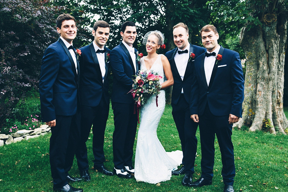 A bride wearing two dresses (including a Tadashi Shoji evening gown) for her glamorous, Gatsby inspired barn wedding. Photography by Mister Phill. mister phill photography, gastsby wedding, rustic barn wedding, tadashi shoji wedding dress