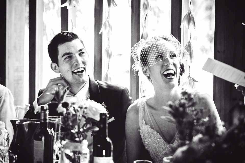 A bride wearing two dresses (including a Tadashi Shoji evening gown) for her glamorous, Gatsby inspired barn wedding. Photography by Mister Phill. mister phill photography, gastsby wedding, rustic barn wedding, tadashi shoji wedding dress