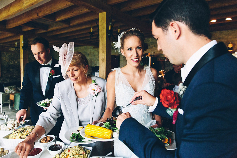 A bride wearing two dresses (including a Tadashi Shoji evening gown) for her glamorous, Gatsby inspired barn wedding. Photography by Mister Phill. mister phill photography, gastsby wedding, rustic barn wedding, tadashi shoji wedding dress