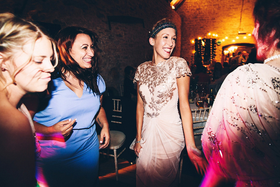 A bride wearing two dresses (including a Tadashi Shoji evening gown) for her glamorous, Gatsby inspired barn wedding. Photography by Mister Phill. mister phill photography, gastsby wedding, rustic barn wedding, tadashi shoji wedding dress
