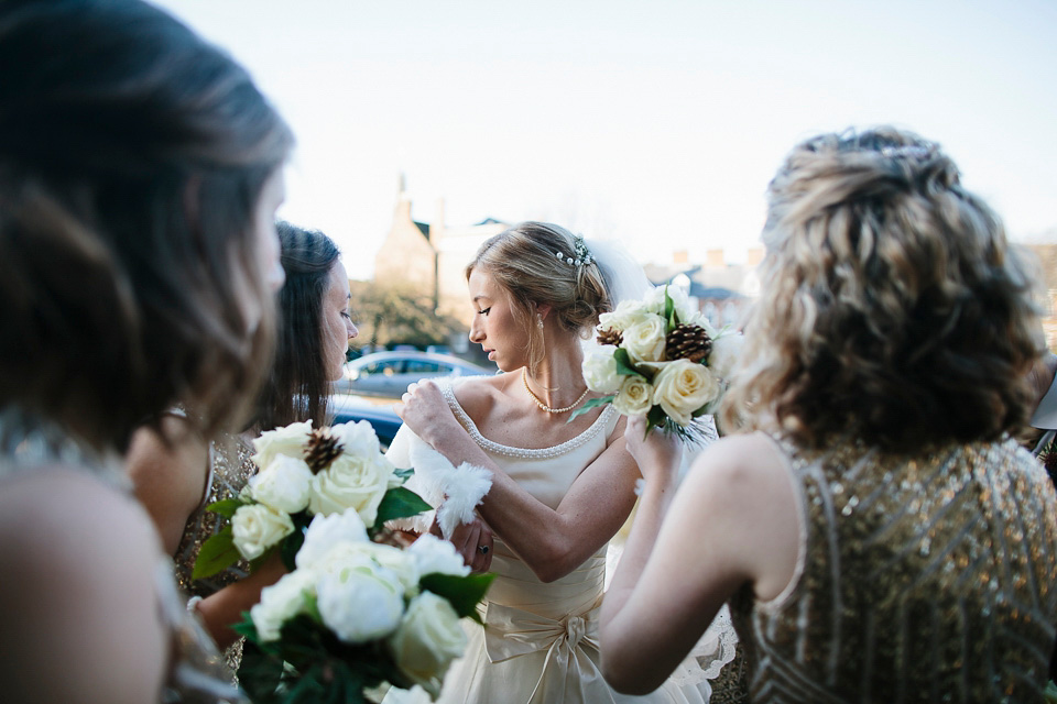 A bride wearing Alan Hannah for her Glouceste Cathedral winter wedding. Photography by Ruth Atkinson. alan hannah wedding dress, gloucester cathedral wedding, ruth atkinson photogarphy, winter wedding