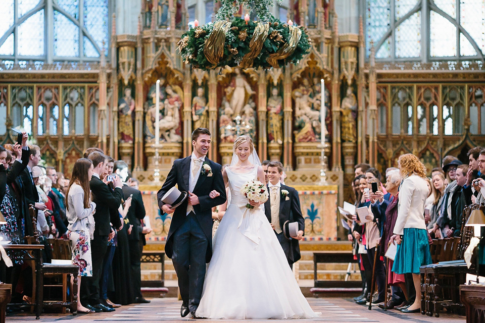 A bride wearing Alan Hannah for her Glouceste Cathedral winter wedding. Photography by Ruth Atkinson. alan hannah wedding dress, gloucester cathedral wedding, ruth atkinson photogarphy, winter wedding