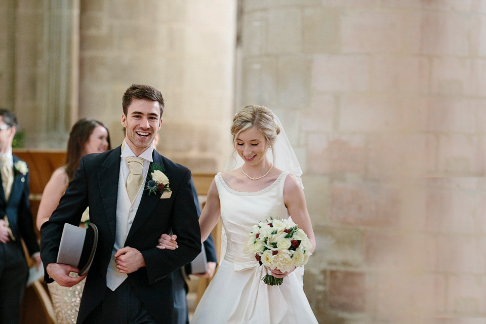 A bride wearing Alan Hannah for her Glouceste Cathedral winter wedding. Photography by Ruth Atkinson. alan hannah wedding dress, gloucester cathedral wedding, ruth atkinson photogarphy, winter wedding