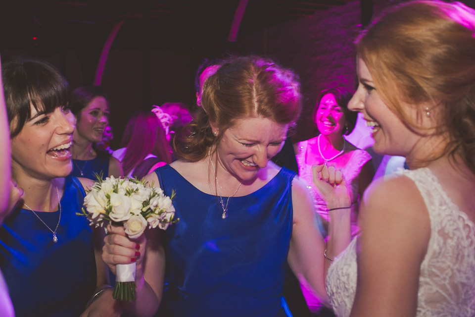 A regally elegant Hampton Court Palace wedding, with a bride wearing Justin Alexander and her bridesmaids in cobalt blue Ghost dresses. Photography by Nick Rose. hampton court palace wedding, justin alexander wedding dress, cobalt blue bridesmaid dresses, regal wedding