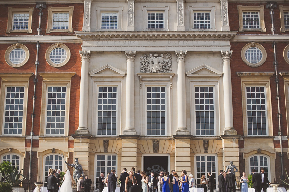 A regally elegant Hampton Court Palace wedding, with a bride wearing Justin Alexander and her bridesmaids in cobalt blue Ghost dresses. Photography by Nick Rose. hampton court palace wedding, justin alexander wedding dress, cobalt blue bridesmaid dresses, regal wedding