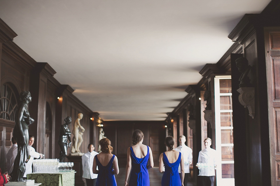 A regally elegant Hampton Court Palace wedding, with a bride wearing Justin Alexander and her bridesmaids in cobalt blue Ghost dresses. Photography by Nick Rose. hampton court palace wedding, justin alexander wedding dress, cobalt blue bridesmaid dresses, regal wedding