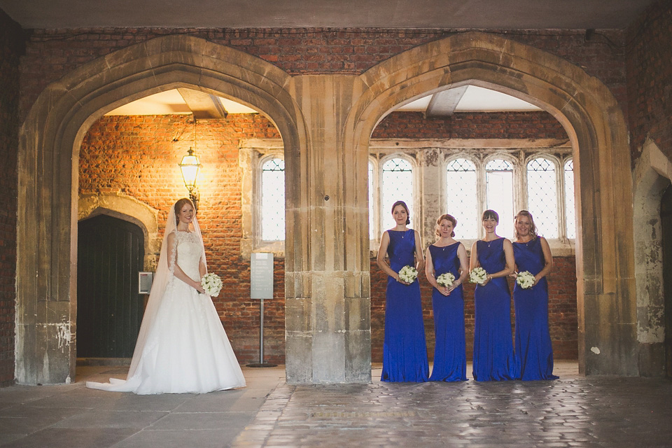 A regally elegant Hampton Court Palace wedding, with a bride wearing Justin Alexander and her bridesmaids in cobalt blue Ghost dresses. Photography by Nick Rose. hampton court palace wedding, justin alexander wedding dress, cobalt blue bridesmaid dresses, regal wedding