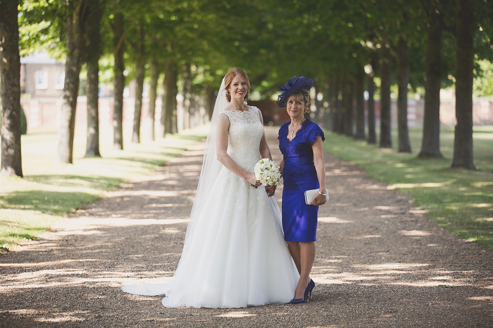 A regally elegant Hampton Court Palace wedding, with a bride wearing Justin Alexander and her bridesmaids in cobalt blue Ghost dresses. Photography by Nick Rose. hampton court palace wedding, justin alexander wedding dress, cobalt blue bridesmaid dresses, regal wedding