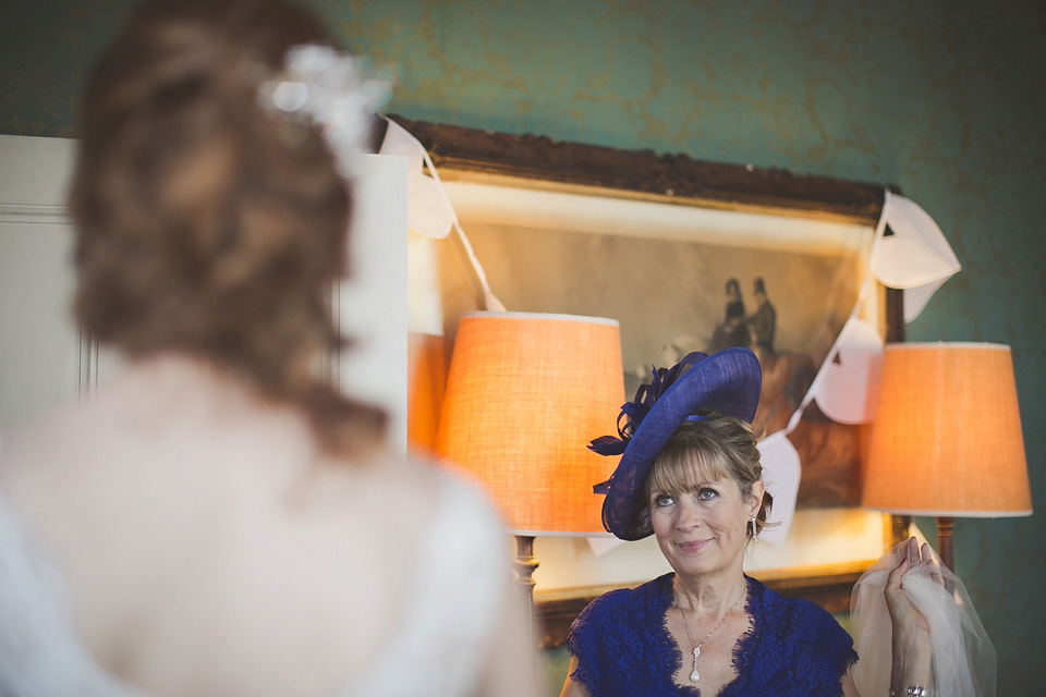 A regally elegant Hampton Court Palace wedding, with a bride wearing Justin Alexander and her bridesmaids in cobalt blue Ghost dresses. Photography by Nick Rose. hampton court palace wedding, justin alexander wedding dress, cobalt blue bridesmaid dresses, regal wedding