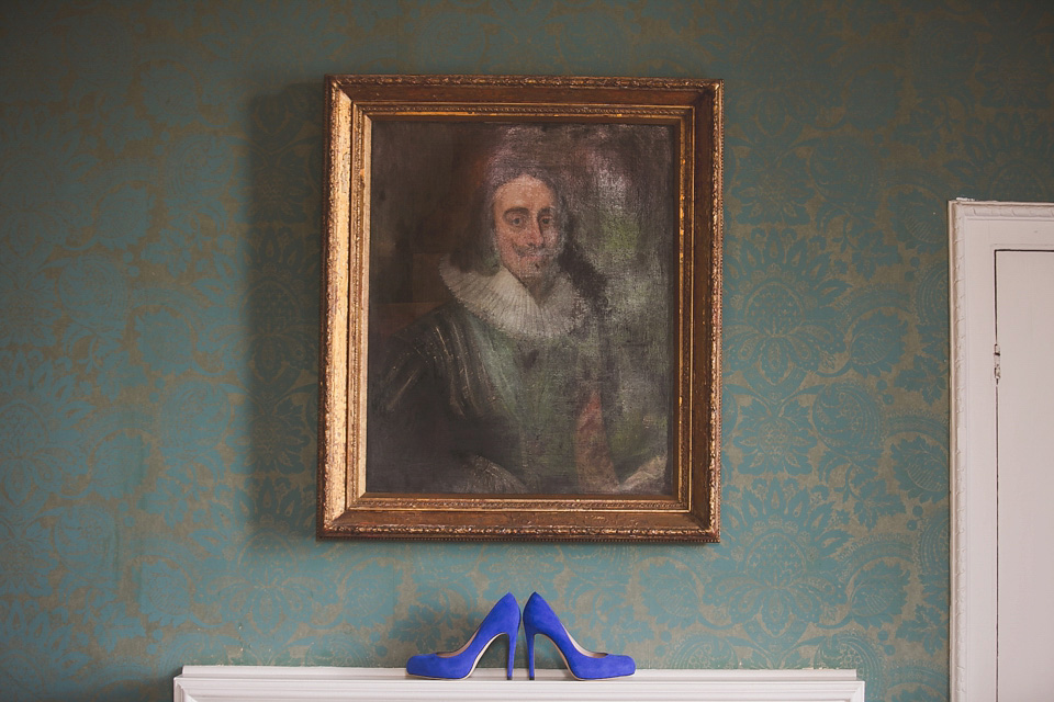 A regally elegant Hampton Court Palace wedding, with a bride wearing Justin Alexander and her bridesmaids in cobalt blue Ghost dresses. Photography by Nick Rose. hampton court palace wedding, justin alexander wedding dress, cobalt blue bridesmaid dresses, regal wedding