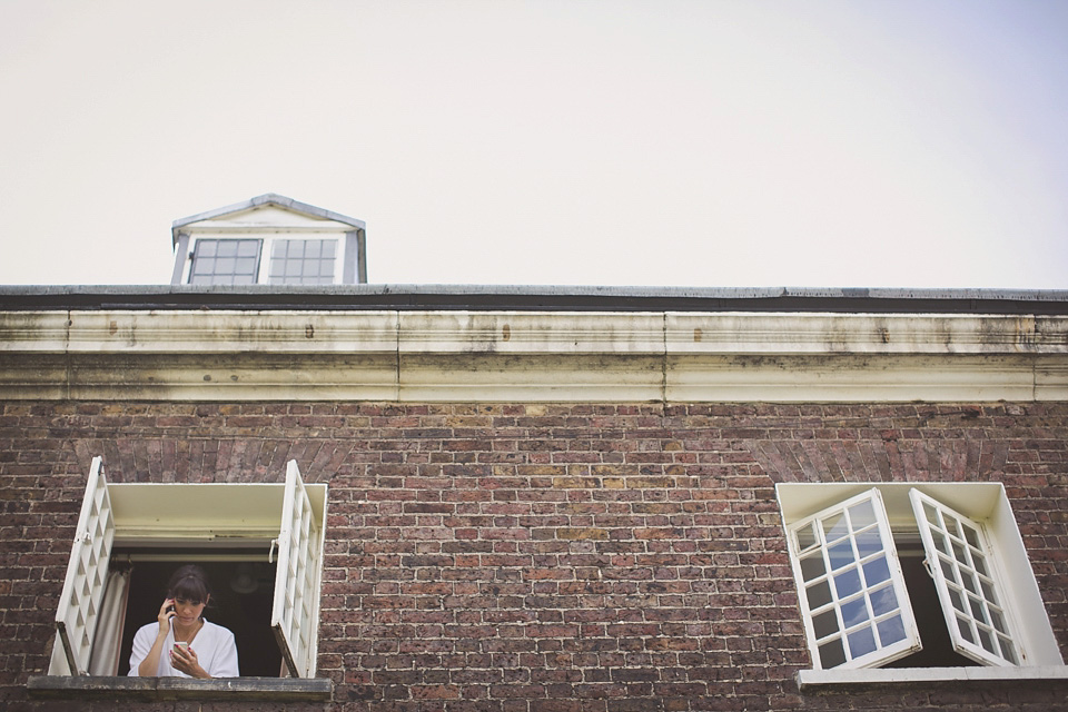 A regally elegant Hampton Court Palace wedding, with a bride wearing Justin Alexander and her bridesmaids in cobalt blue Ghost dresses. Photography by Nick Rose. hampton court palace wedding, justin alexander wedding dress, cobalt blue bridesmaid dresses, regal wedding