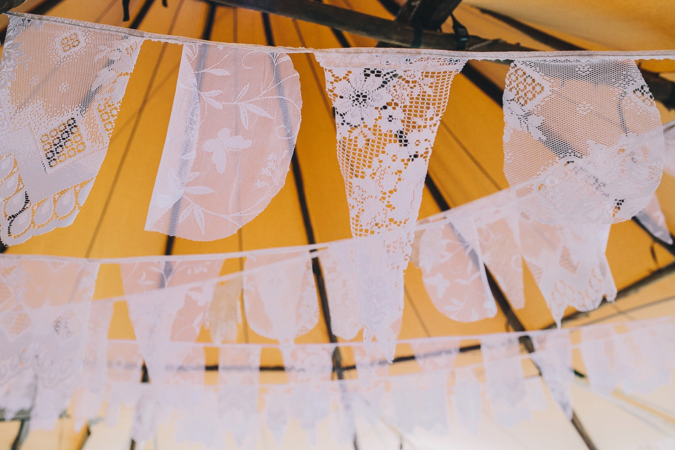 A bride wearing San Patrick for her Humanist handfasting ceremony at Talton Lodge. Photography by Sara Lincoln.