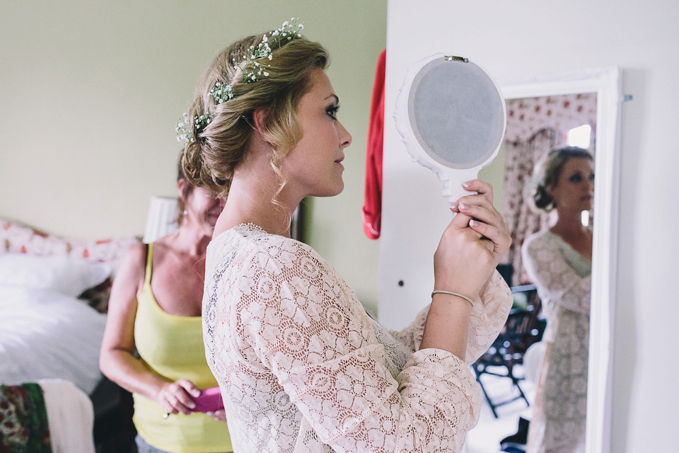 A bride wearing San Patrick for her Humanist handfasting ceremony at Talton Lodge. Photography by Sara Lincoln.