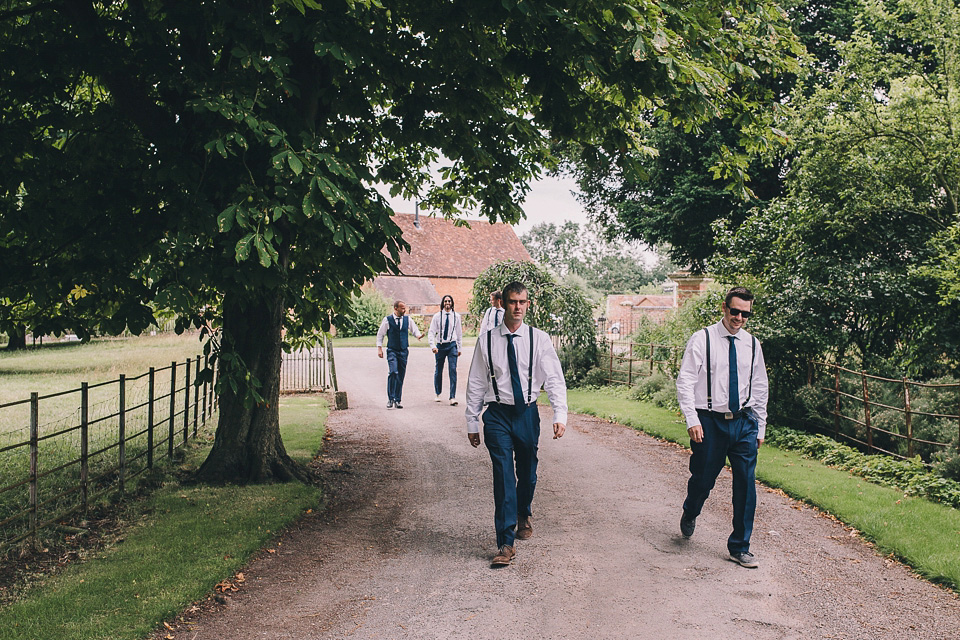 A bride wearing San Patrick for her Humanist handfasting ceremony at Talton Lodge. Photography by Sara Lincoln.