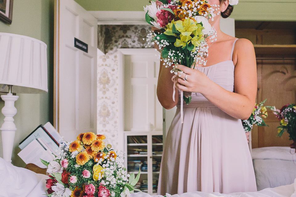 A bride wearing San Patrick for her Humanist handfasting ceremony at Talton Lodge. Photography by Sara Lincoln.