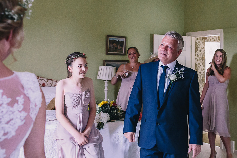 A bride wearing San Patrick for her Humanist handfasting ceremony at Talton Lodge. Photography by Sara Lincoln.