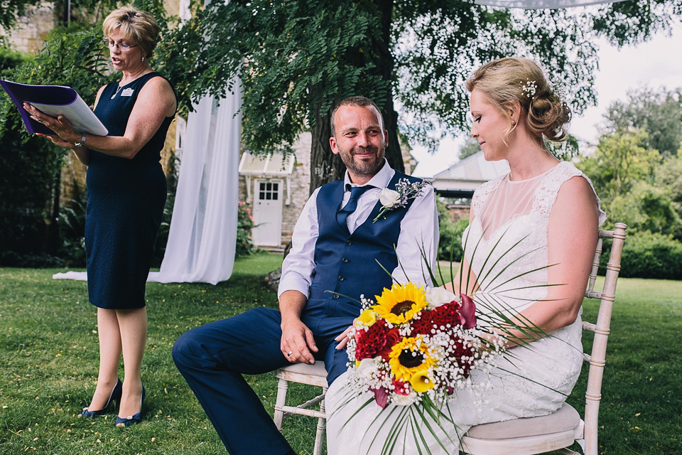 A bride wearing San Patrick for her Humanist handfasting ceremony at Talton Lodge. Photography by Sara Lincoln.