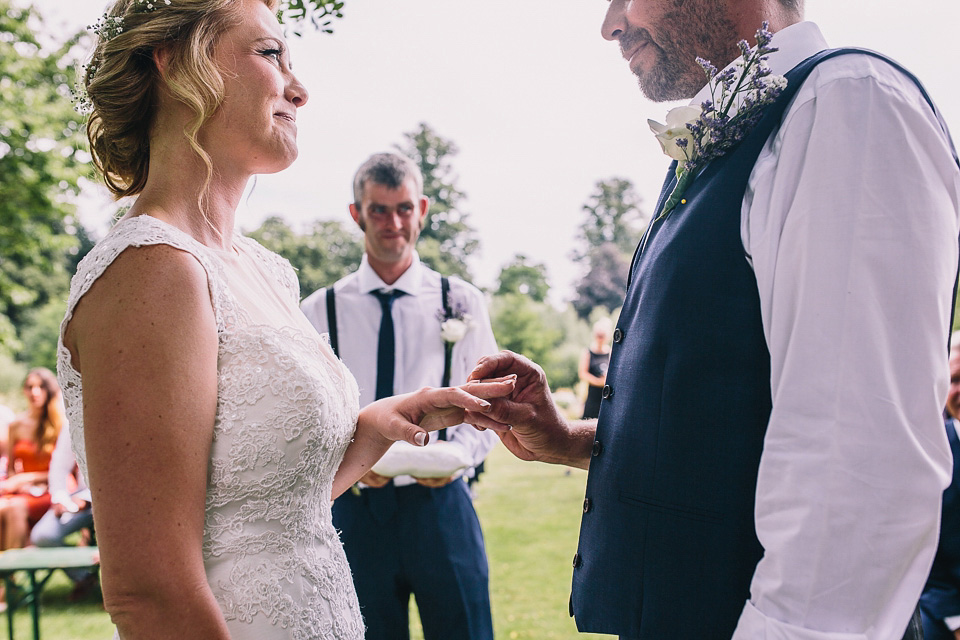 A bride wearing San Patrick for her Humanist handfasting ceremony at Talton Lodge. Photography by Sara Lincoln.