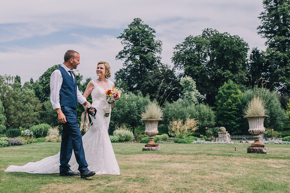 A bride wearing San Patrick for her Humanist handfasting ceremony at Talton Lodge. Photography by Sara Lincoln.