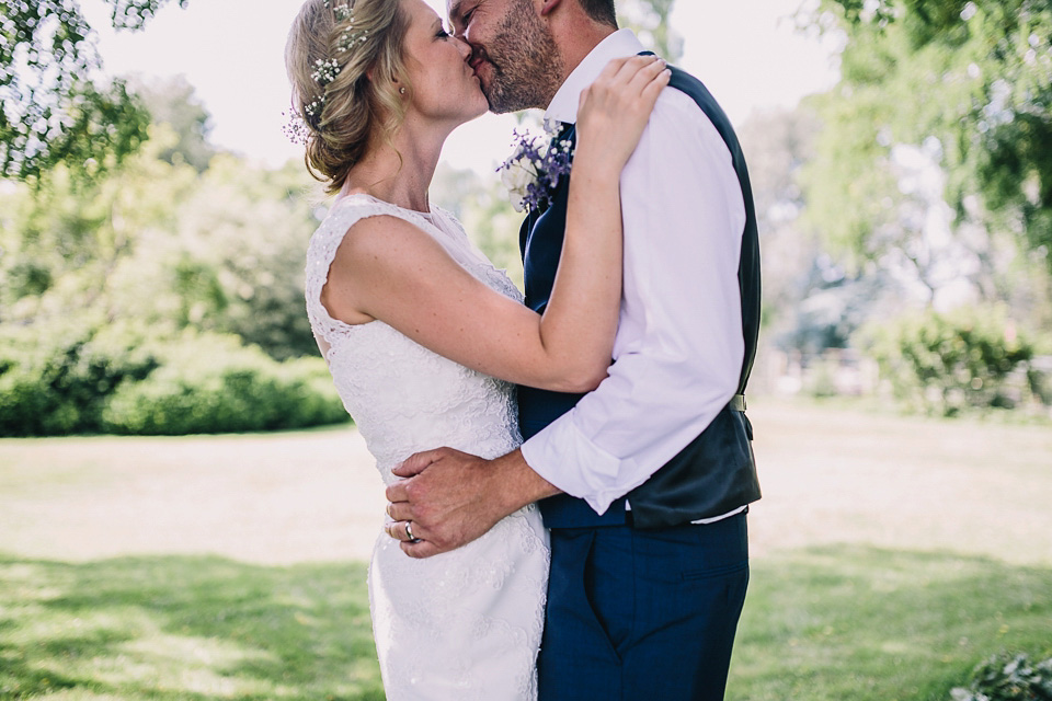 A bride wearing San Patrick for her Humanist handfasting ceremony at Talton Lodge. Photography by Sara Lincoln.