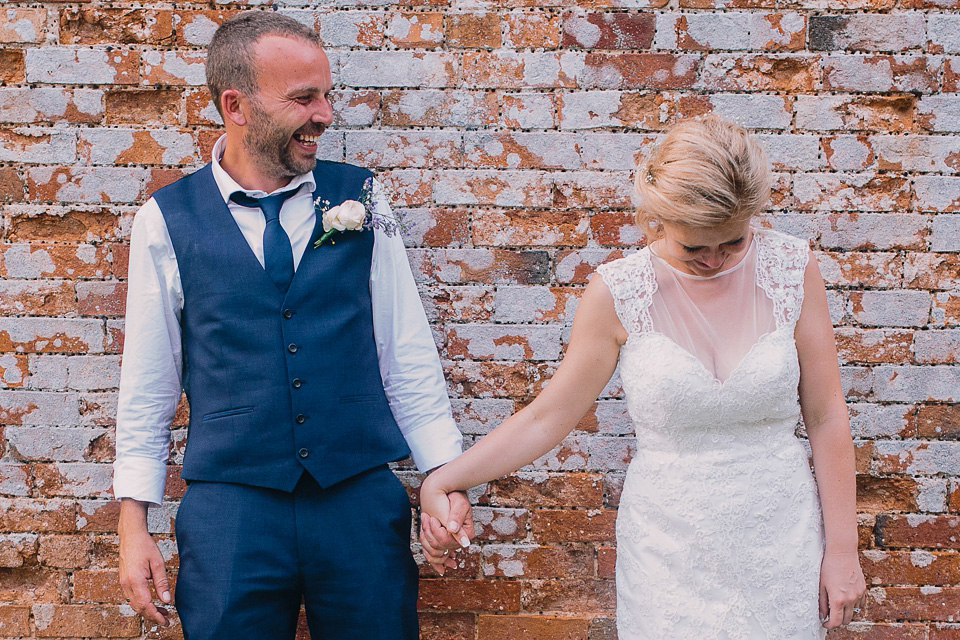 A bride wearing San Patrick for her Humanist handfasting ceremony at Talton Lodge. Photography by Sara Lincoln.