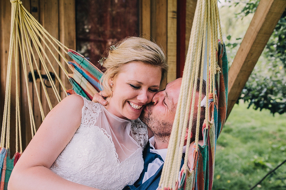 A bride wearing San Patrick for her Humanist handfasting ceremony at Talton Lodge. Photography by Sara Lincoln.