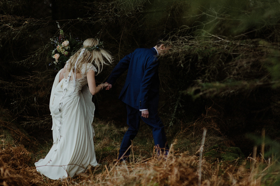 A wedding at Crear on the West Coast of Scotland, featuring moss and antlers and a Midsummer Nights Dream style bride in her Rowanjoy dress and floral circlet by Myrtle & Bracken Florists. Images by Kitchener Photography. crear, scotland, kitchener photography, worldly nomad fimls, myrtle and bracken, midsummer nights dream