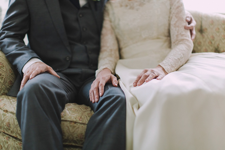 An original 1960s vintage wedding dress worn by Bride Jen for her sweet and stylish Minnesota wedding. Photography by Carla Boecklin. Carla Boecklin photography, Minnesota weddings, 1960's vintage