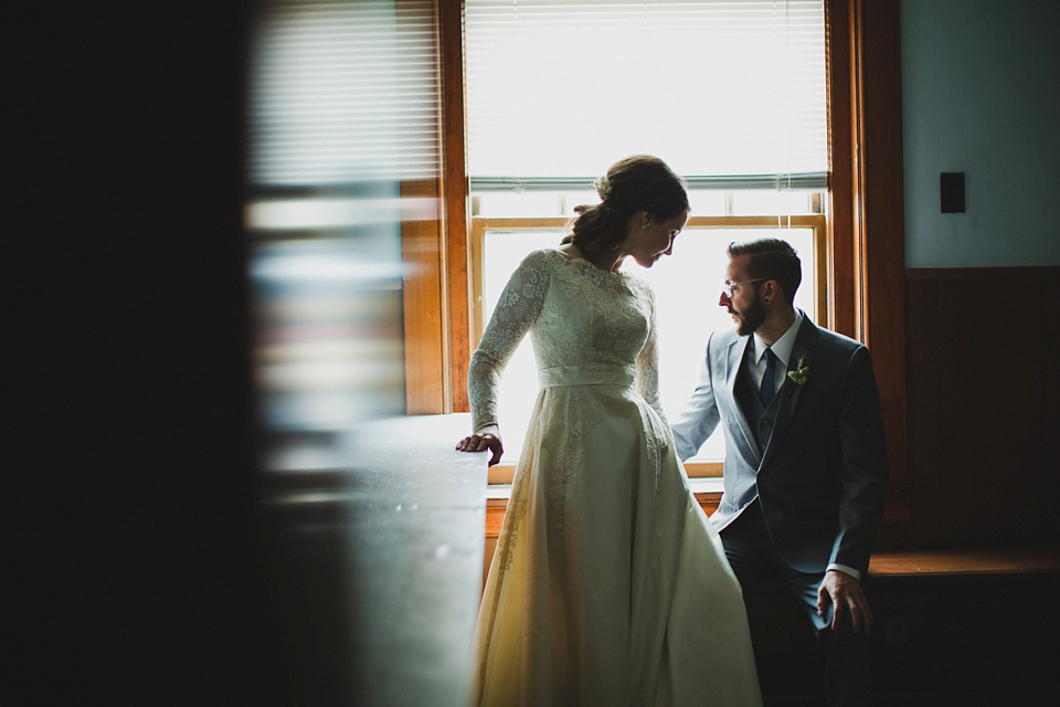 An original 1960s vintage wedding dress worn by Bride Jen for her sweet and stylish Minnesota wedding. Photography by Carla Boecklin. Carla Boecklin photography, Minnesota weddings, 1960's vintage