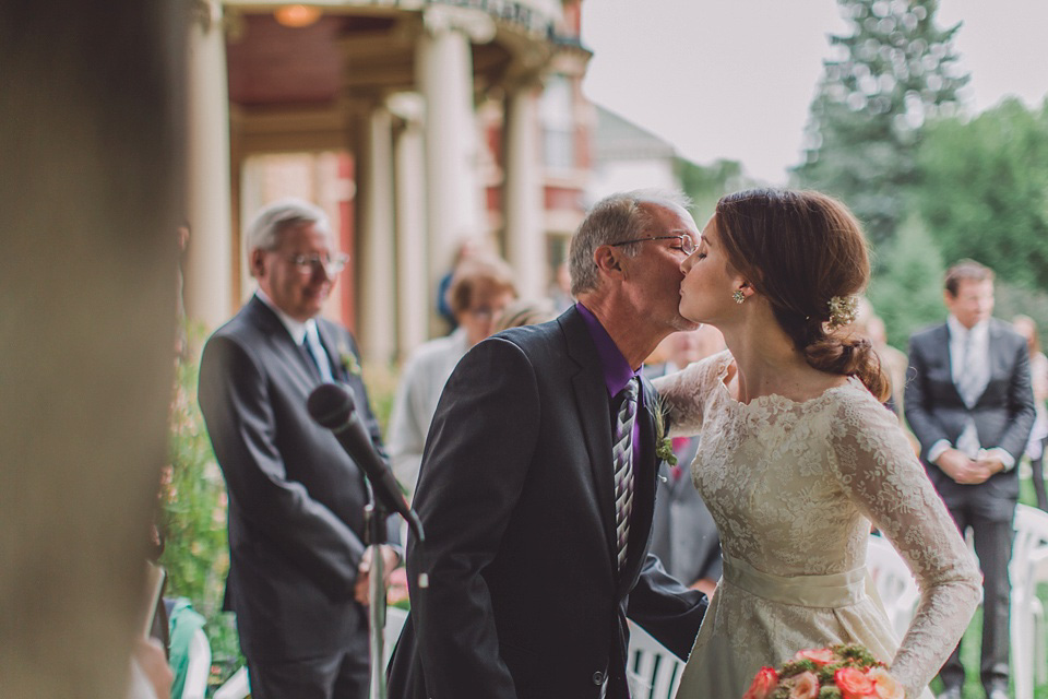 An original 1960s vintage wedding dress worn by Bride Jen for her sweet and stylish Minnesota wedding. Photography by Carla Boecklin. Carla Boecklin photography, Minnesota weddings, 1960's vintage