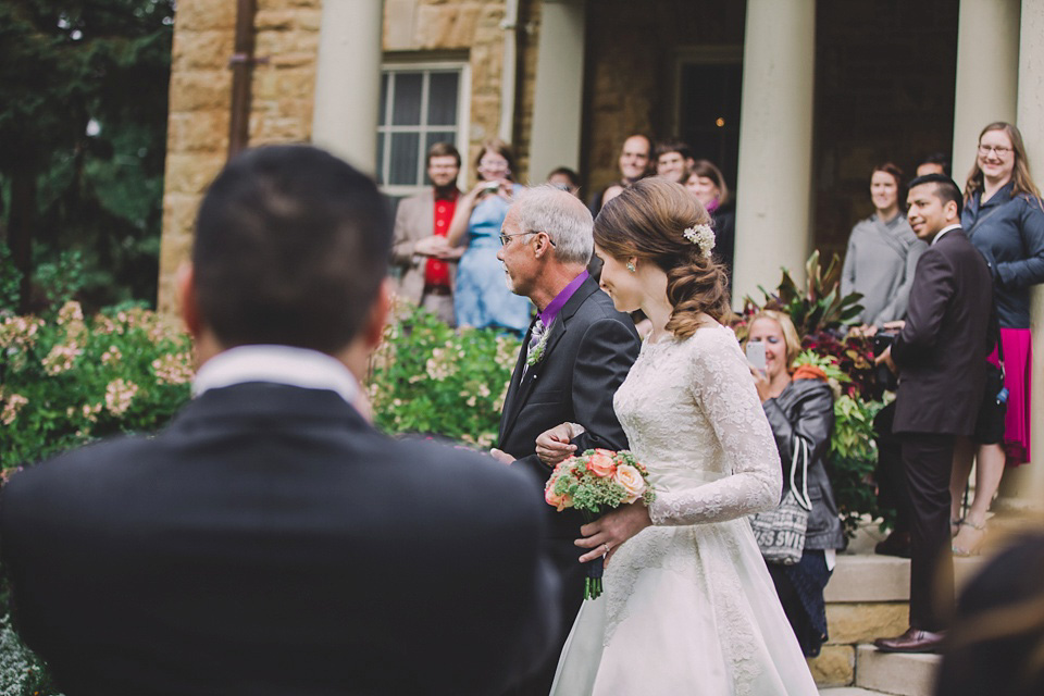 An original 1960s vintage wedding dress worn by Bride Jen for her sweet and stylish Minnesota wedding. Photography by Carla Boecklin. Carla Boecklin photography, Minnesota weddings, 1960's vintage