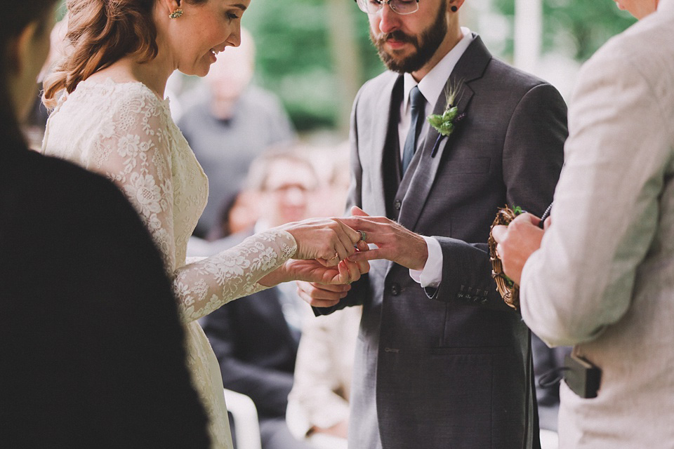 An original 1960s vintage wedding dress worn by Bride Jen for her sweet and stylish Minnesota wedding. Photography by Carla Boecklin. Carla Boecklin photography, Minnesota weddings, 1960's vintage