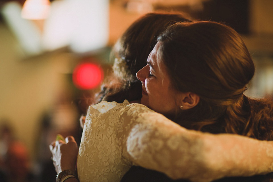 An original 1960s vintage wedding dress worn by Bride Jen for her sweet and stylish Minnesota wedding. Photography by Carla Boecklin. Carla Boecklin photography, Minnesota weddings, 1960's vintage