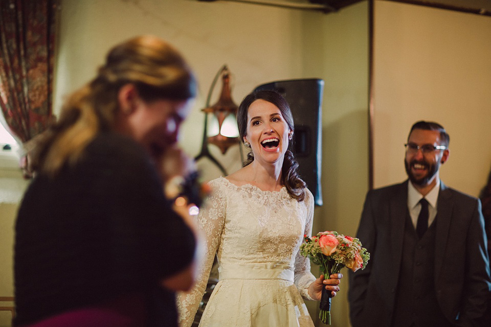 An original 1960s vintage wedding dress worn by Bride Jen for her sweet and stylish Minnesota wedding. Photography by Carla Boecklin. Carla Boecklin photography, Minnesota weddings, 1960's vintage
