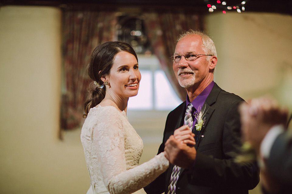 An original 1960s vintage wedding dress worn by Bride Jen for her sweet and stylish Minnesota wedding. Photography by Carla Boecklin. Carla Boecklin photography, Minnesota weddings, 1960's vintage