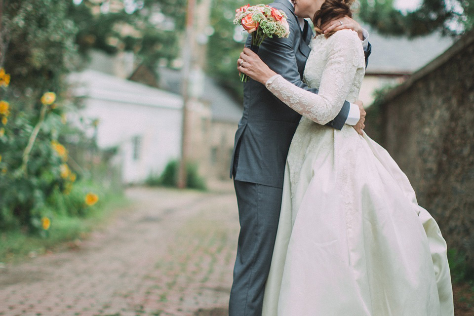An original 1960s vintage wedding dress worn by Bride Jen for her sweet and stylish Minnesota wedding. Photography by Carla Boecklin. Carla Boecklin photography, Minnesota weddings, 1960's vintage