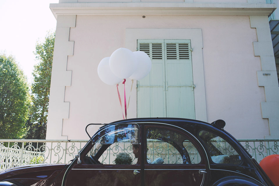 2CV with white wedding balloons.  Image by Hearts on Fire Photography.