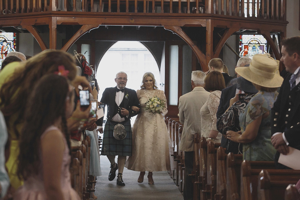 A bride wearing a ballerina length dress and Juliet cap veil for her soft blush pink and liberty print inspired wedding in Scotland.  Photography by Mirrorbox Photography.