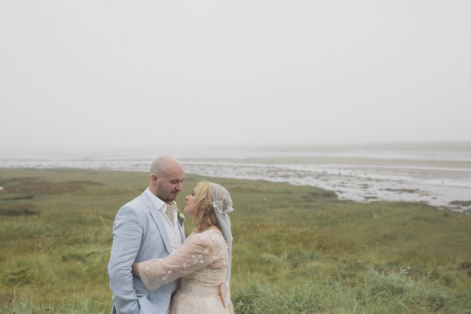 A bride wearing a ballerina length dress and Juliet cap veil for her soft blush pink and liberty print inspired wedding in Scotland.  Photography by Mirrorbox Photography.