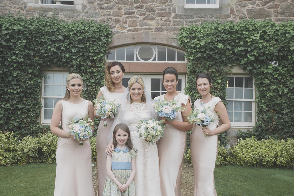 A bride wearing a ballerina length dress and Juliet cap veil for her soft blush pink and liberty print inspired wedding in Scotland.  Photography by Mirrorbox Photography.