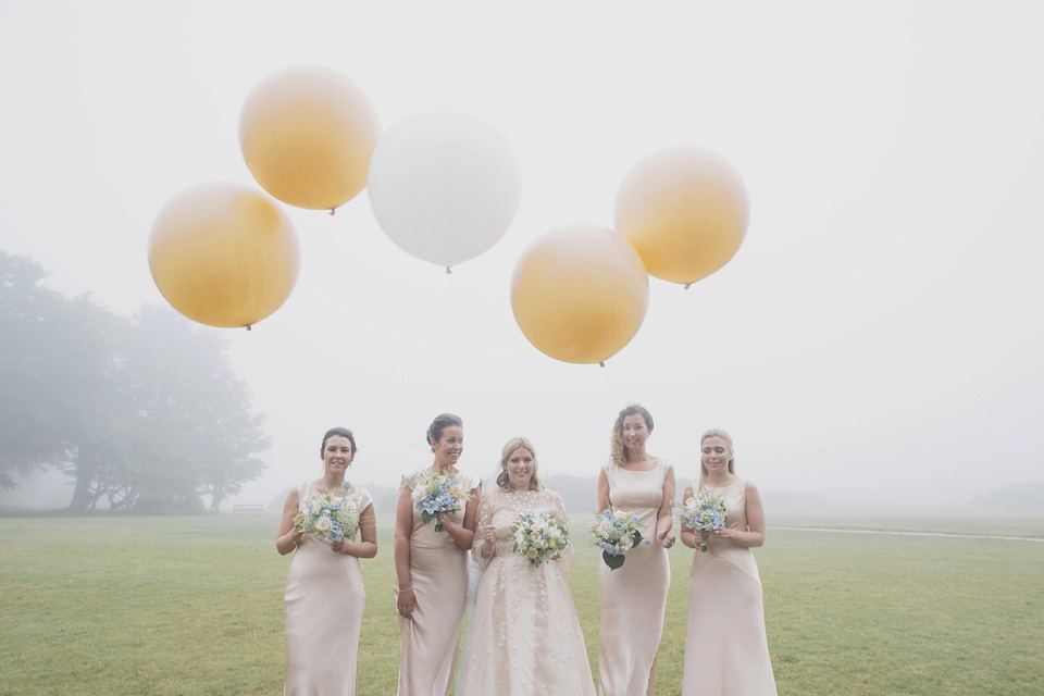 A bride wearing a ballerina length dress and Juliet cap veil for her soft blush pink and liberty print inspired wedding in Scotland.  Photography by Mirrorbox Photography.