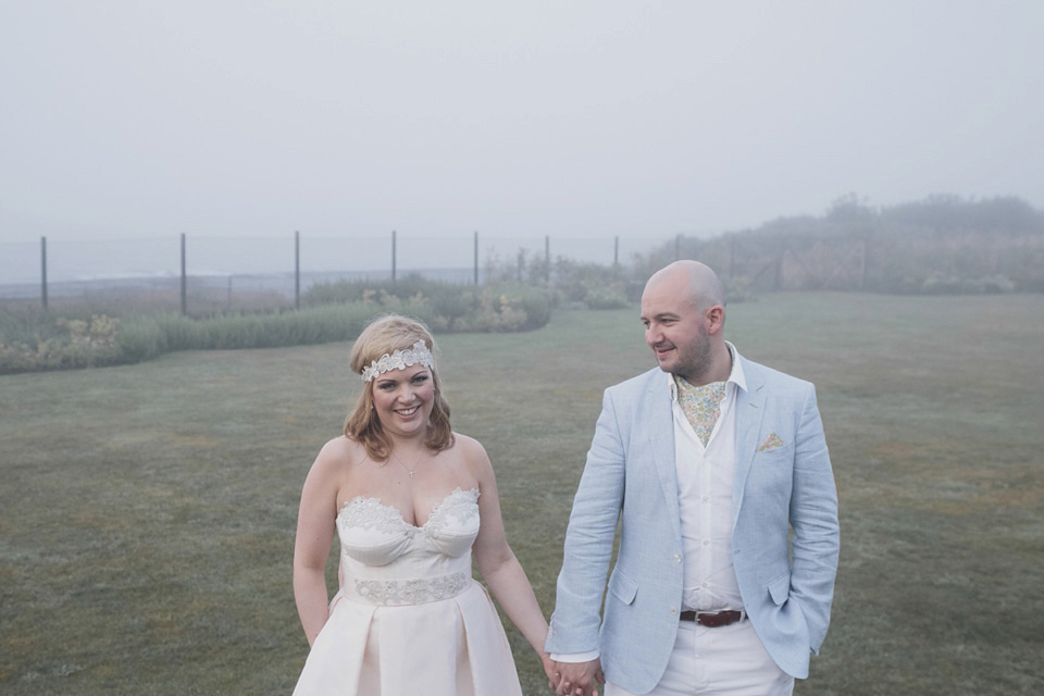 A bride wearing a ballerina length dress and Juliet cap veil for her soft blush pink and liberty print inspired wedding in Scotland.  Photography by Mirrorbox Photography.