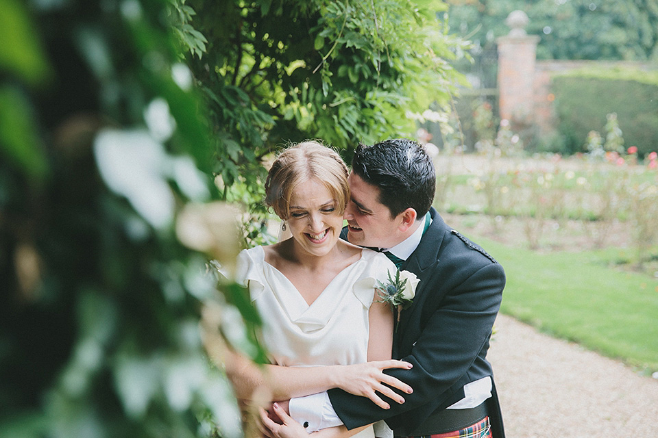 An elegant Halfpenny London dress for an Art Deco and Celtic inspired wedding.  Photography by McKinley Rodgers.