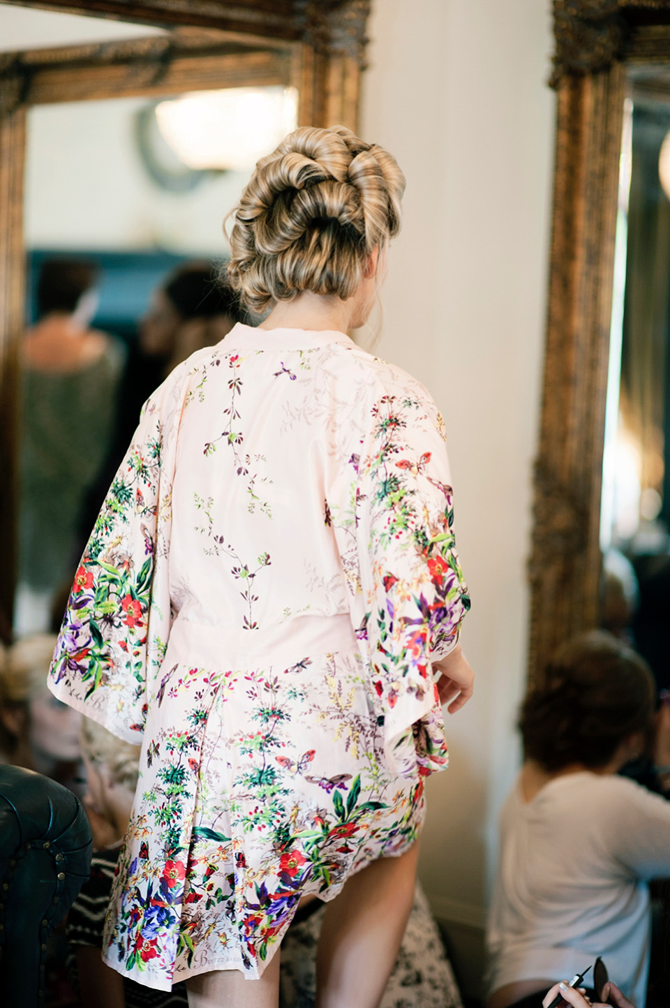 The bride wears a Bo & Luca headpiece and pretty Pronovias gown for her Summer country house wedding at Woodhall Manor in Suffolk. Photography by Kathryn Hopkins.